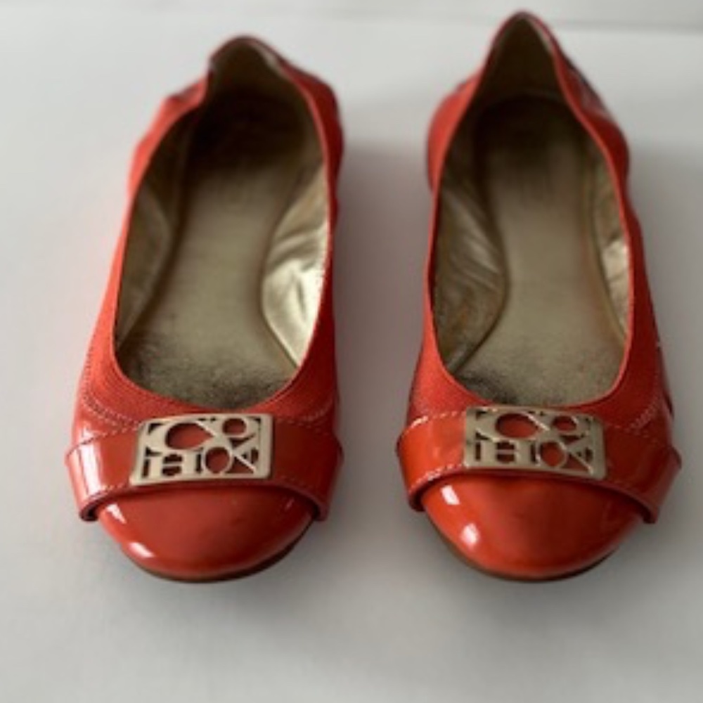 Coach slip on flat orange with gold buckle size 6